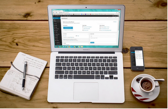 Flatlay phtoto of desk with laptop