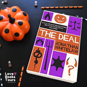 Photo of The Deal next to assorted halloween decorations 